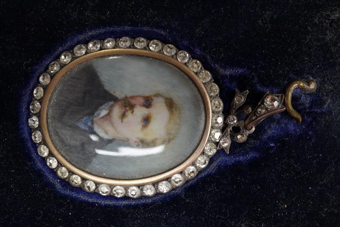 Early 20th century school, Portrait miniature of a gentleman, oval watercolour on ivory, housed in a silver and paste pendant frame, with gilt tooled leather case, 3.5 x 2.5cm CITES Submission reference 5A81E2GB